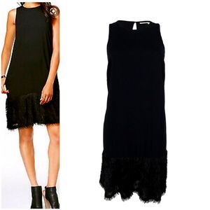Black dress with fringe hem